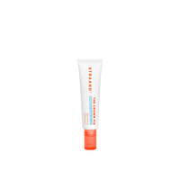 A mini-sized tube of Crown Fix Scalp Serum with a white body and orange cap, labeled with the product name and branding.